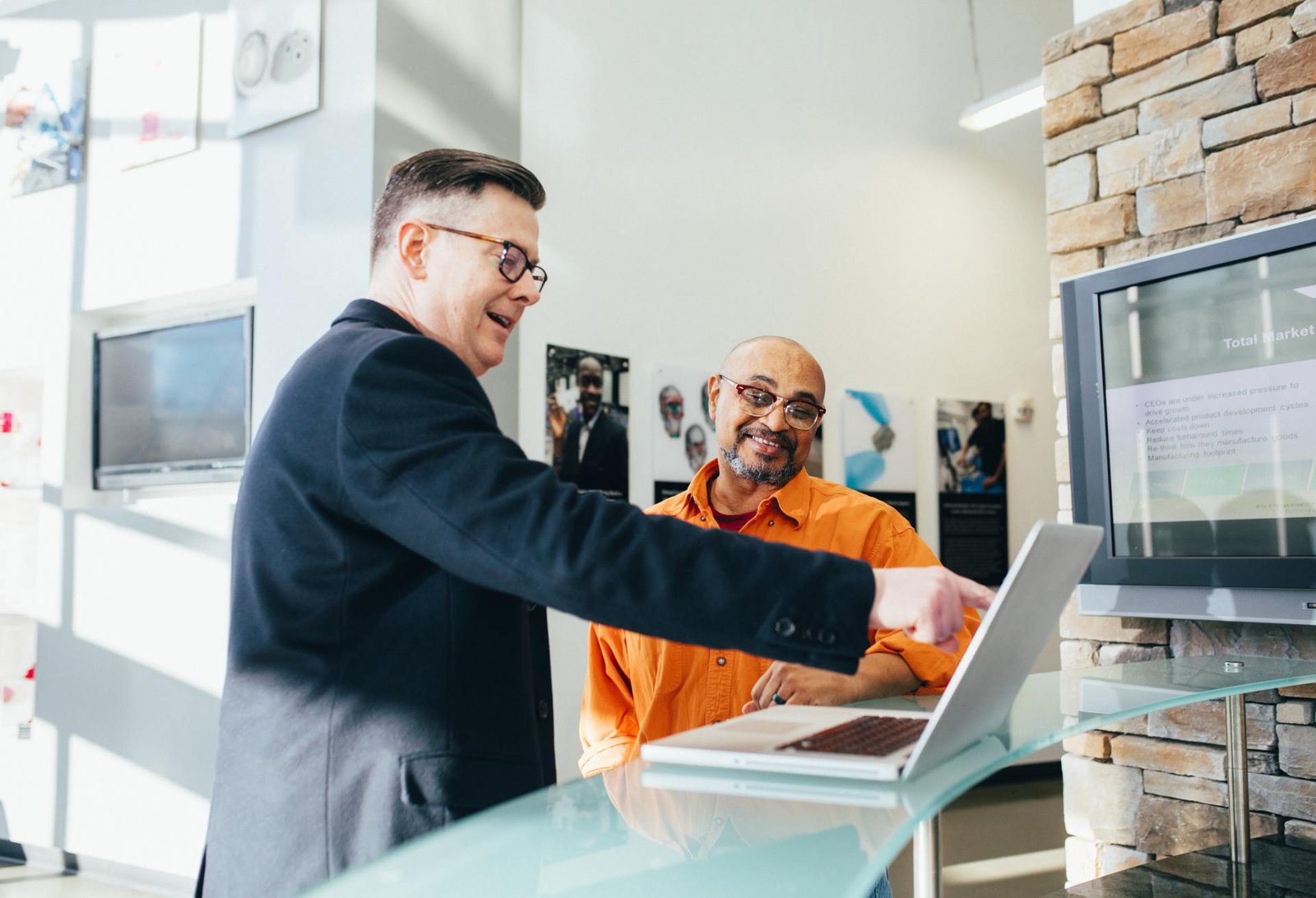 Entrepreneur researching franchise opportunities on laptop